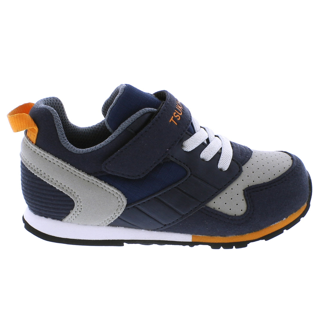Children's sneaker with navy, gray, and orange design on a white background