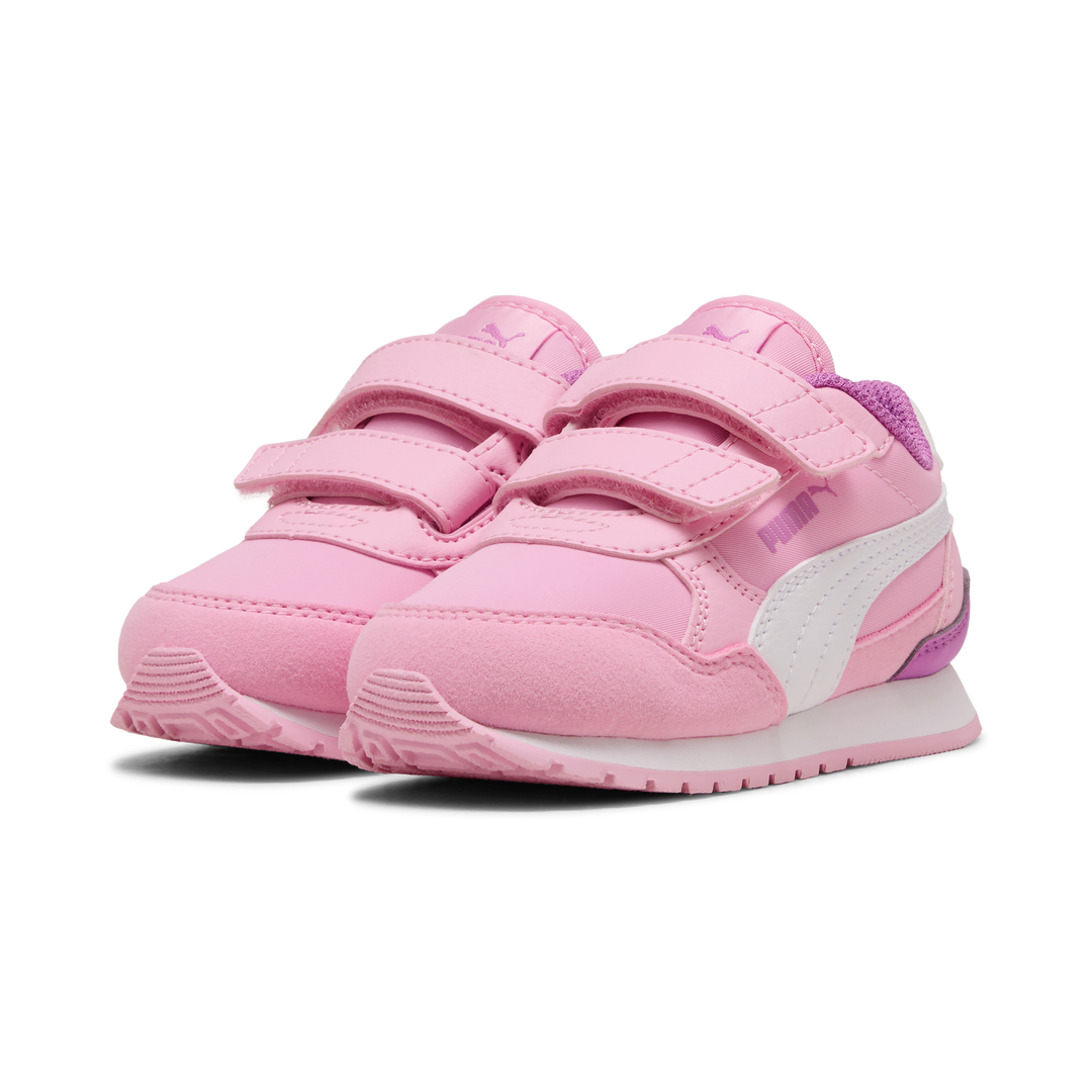 Pair of pink children's sneakers with white soles on a white background