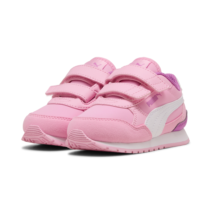 Pair of pink children's sneakers with white soles on a white background