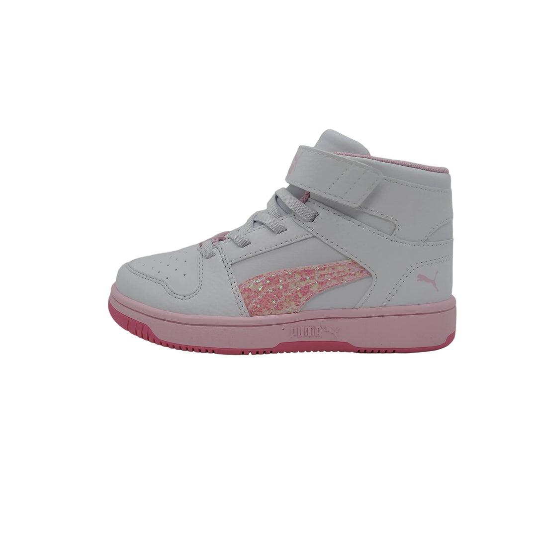 White and pink high-top sneaker with glittery patch on a gray background