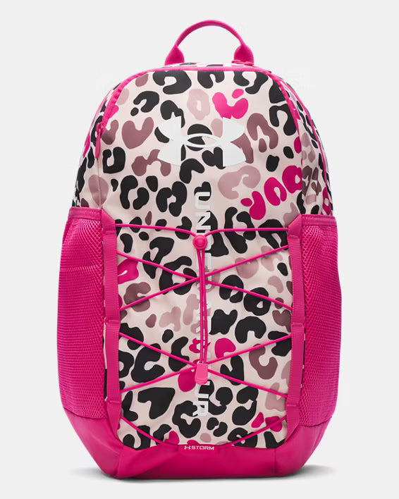 Backpack with pink and black leopard print design on a light gray background