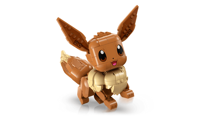 Toy figure of a brown and beige creature on a transparent background