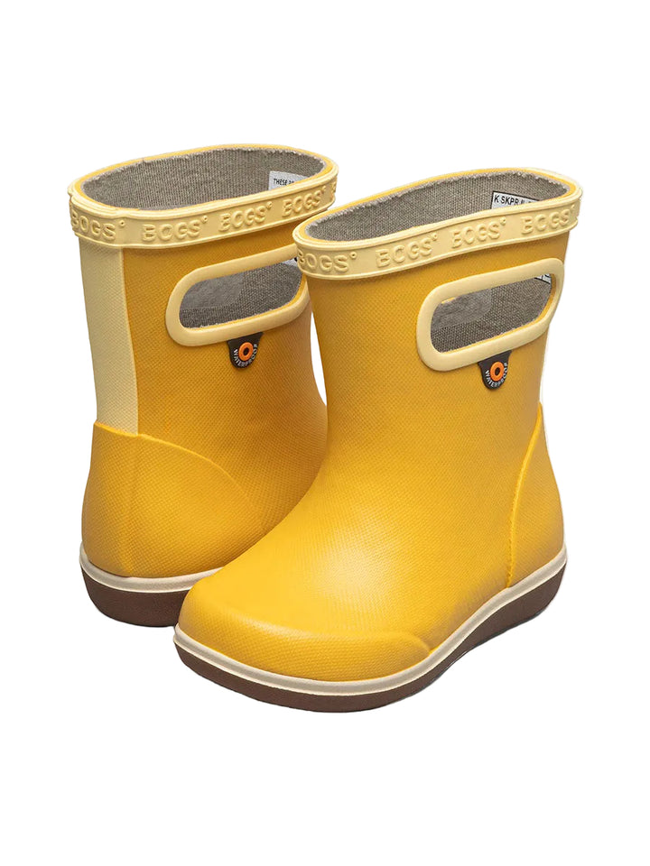 Pair of yellow rain boots with gray soles on a white background
