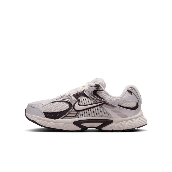 White running shoe with black accents on a white background