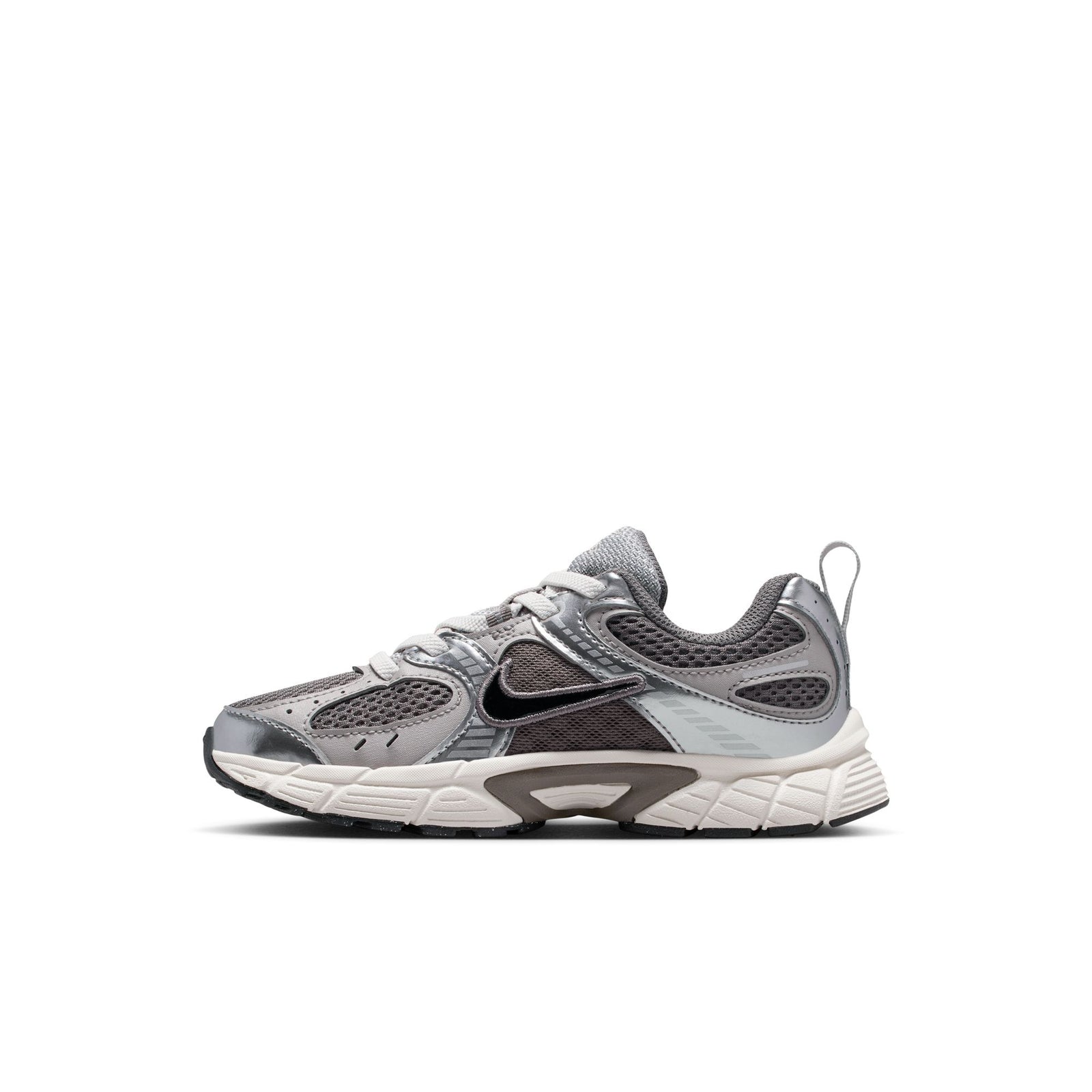 A Nike sneaker in metallic silver and gray with a white midsole, shown from the side profile on a white background.