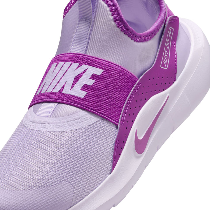 Purple and white Nike sneaker on a white background