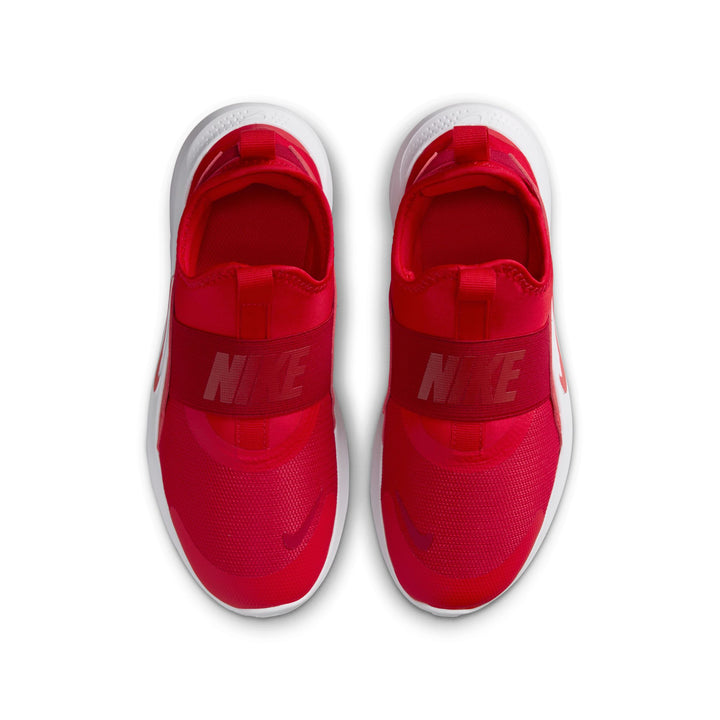 Red Nike slip-on shoes on a white background