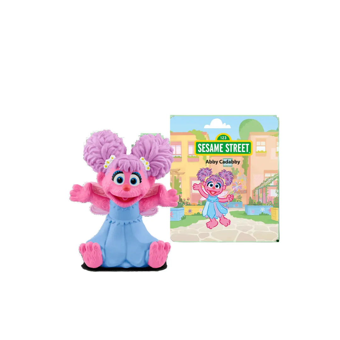 Sesame Street Abby Cadabby toy figure with packaging on a white background