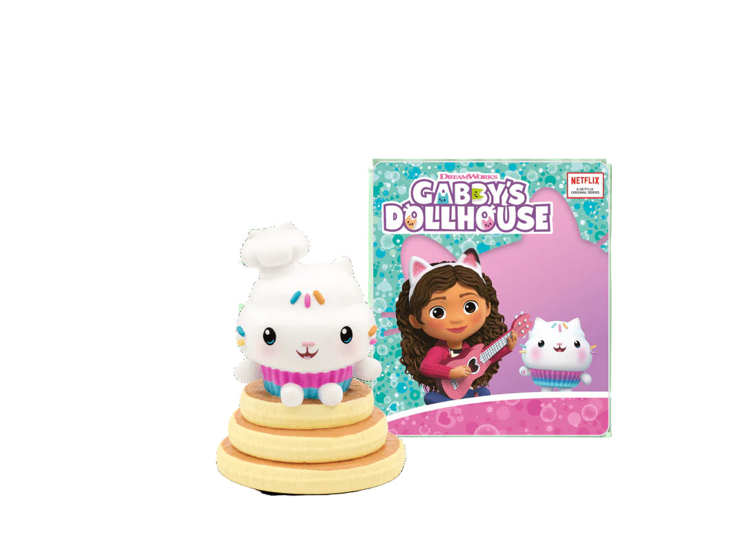 Toy figure on a stack of rings with Gabby's Dollhouse packaging in the background