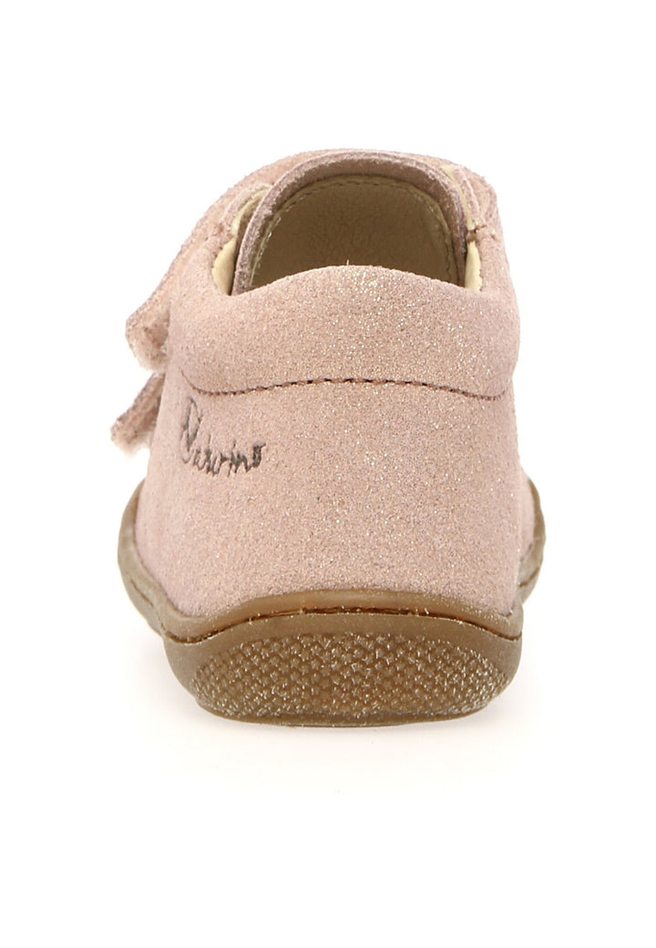 Beige children's shoe with a visible brand logo on a white background