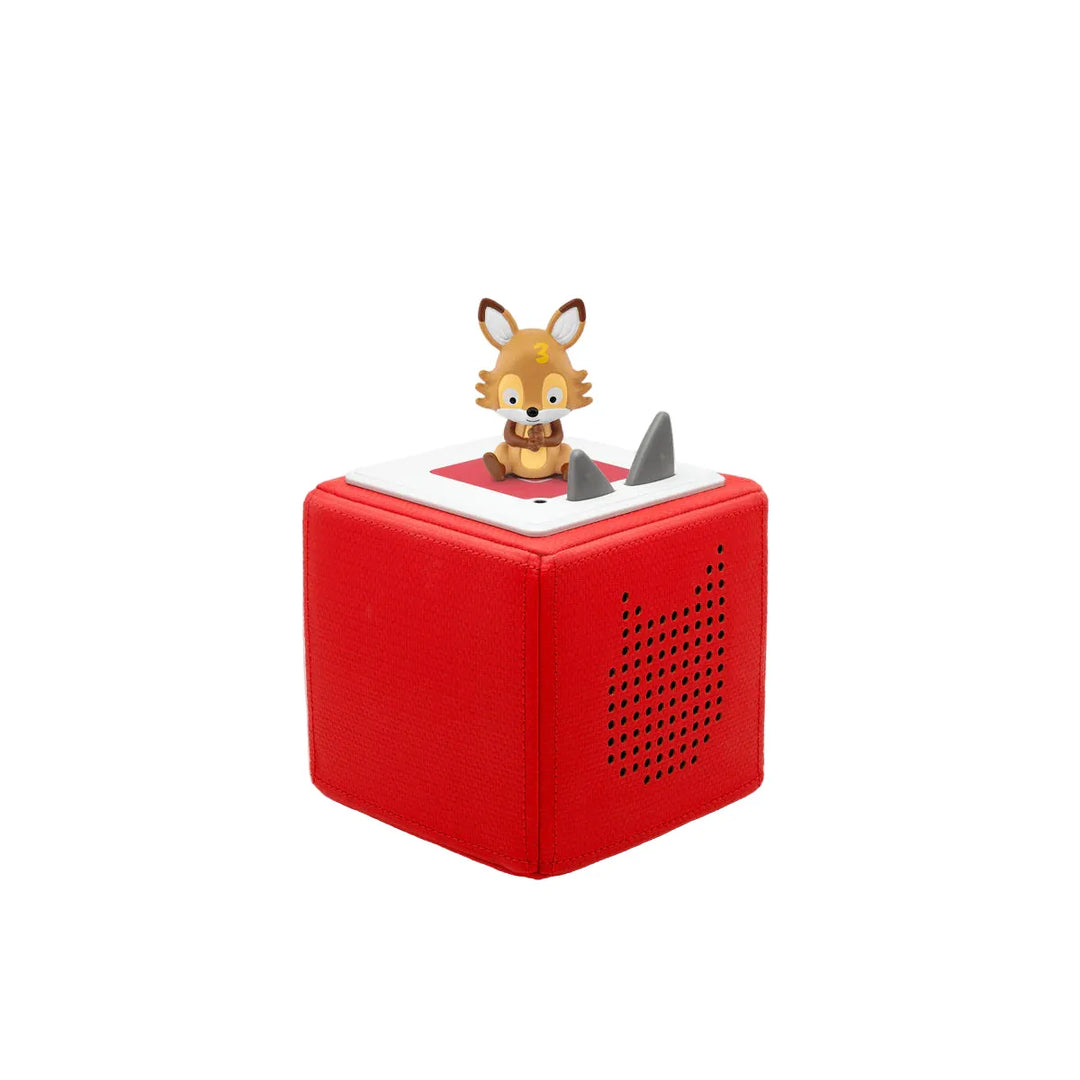 Red toy box with a fox figurine on top against a white background