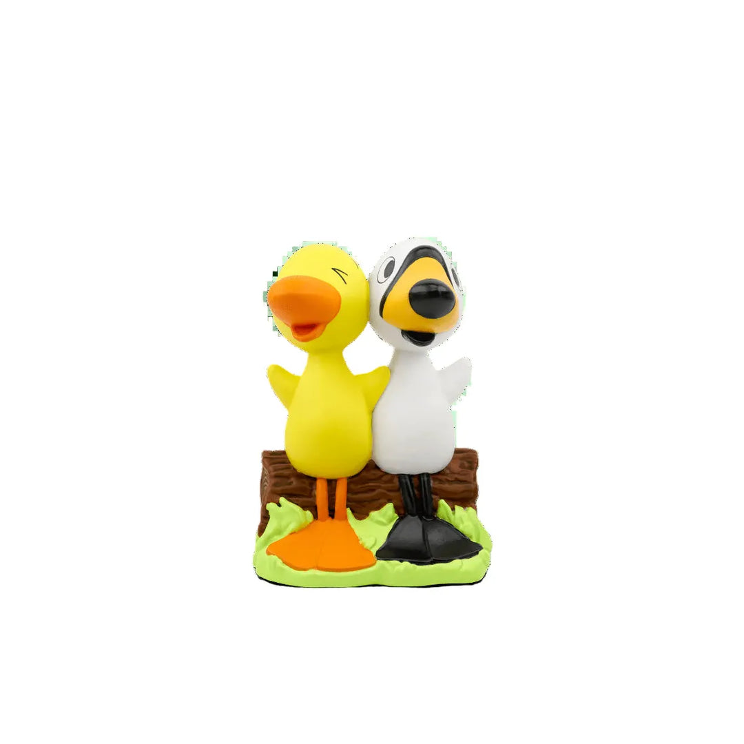 Two cartoon duck figurines standing on a white background