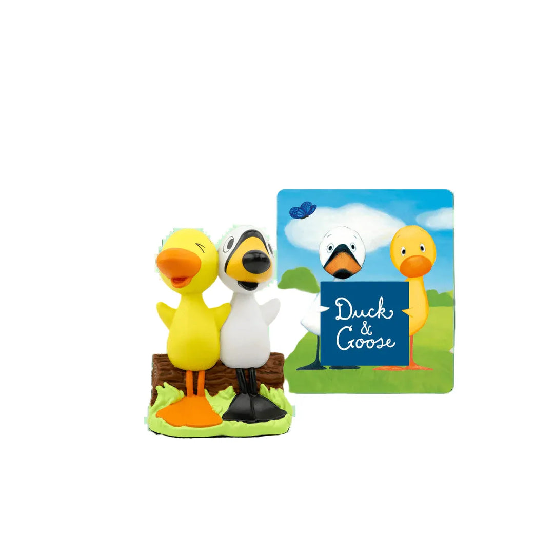 Two duck figurines with a card displaying 'Duck & Goose' on a white background