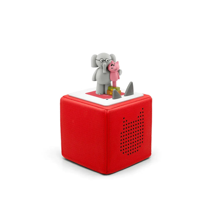 Red toy box with a gray elephant and pink pig on top against a white background