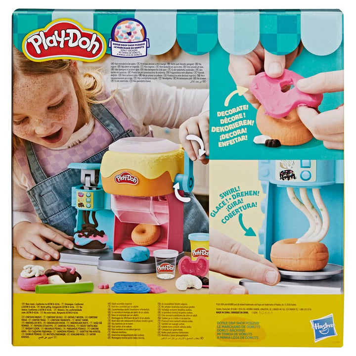 Play-Doh toy set packaging with a child playing with Play-Doh.