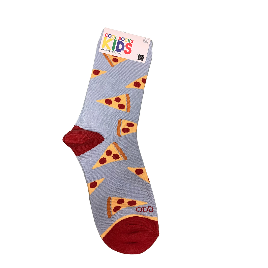 Sock with pizza design on a green surface, featuring 'Cool Socks Kids' brand label.