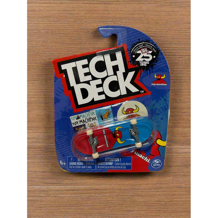 Tech Deck toy machine on a blue and red packaging with visible branding.