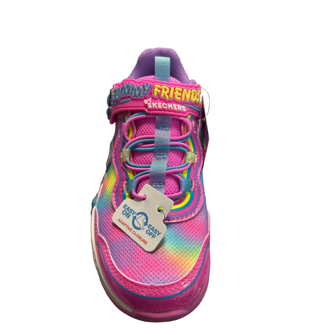 Colorful children's shoe with 'Strawberry Friends' branding on a colorful surface.