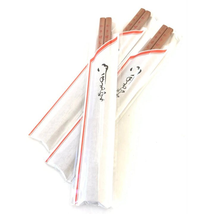 A pack of chopstick pencils with red accents on a white background, featuring Japanese characters.