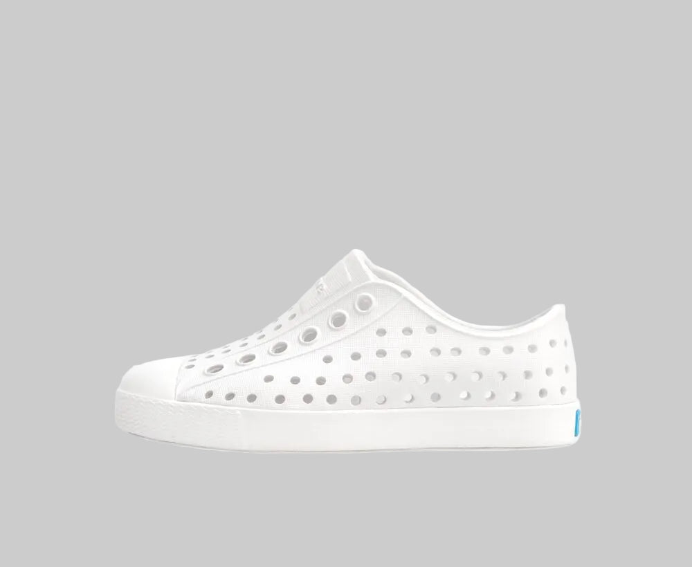 White shoe with holes on a white background