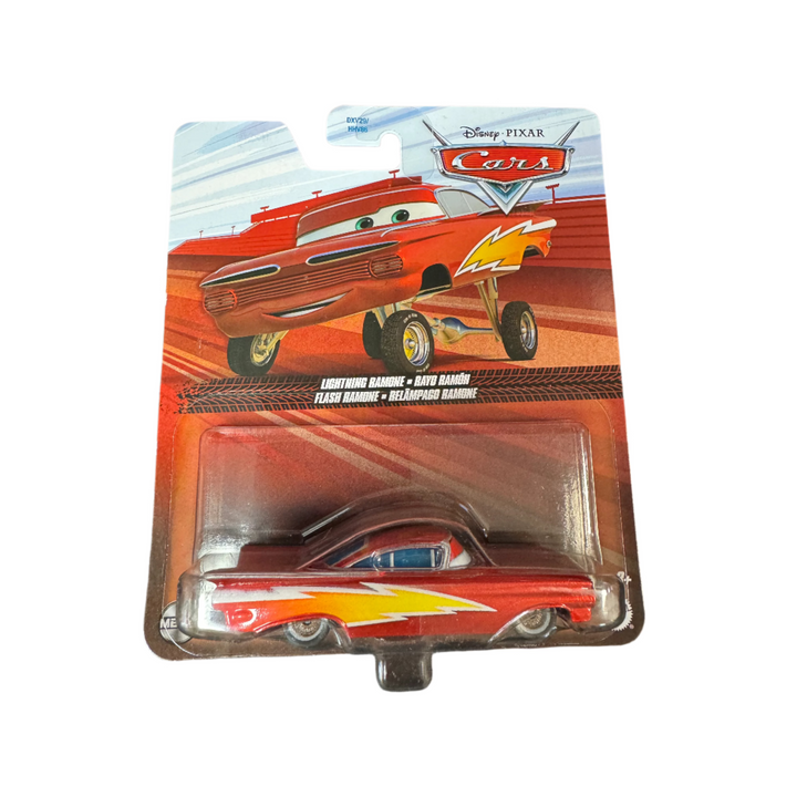 A toy model of the character Flash McQueen from the Disney Pixar Cars movie, packaged in a blister pack.