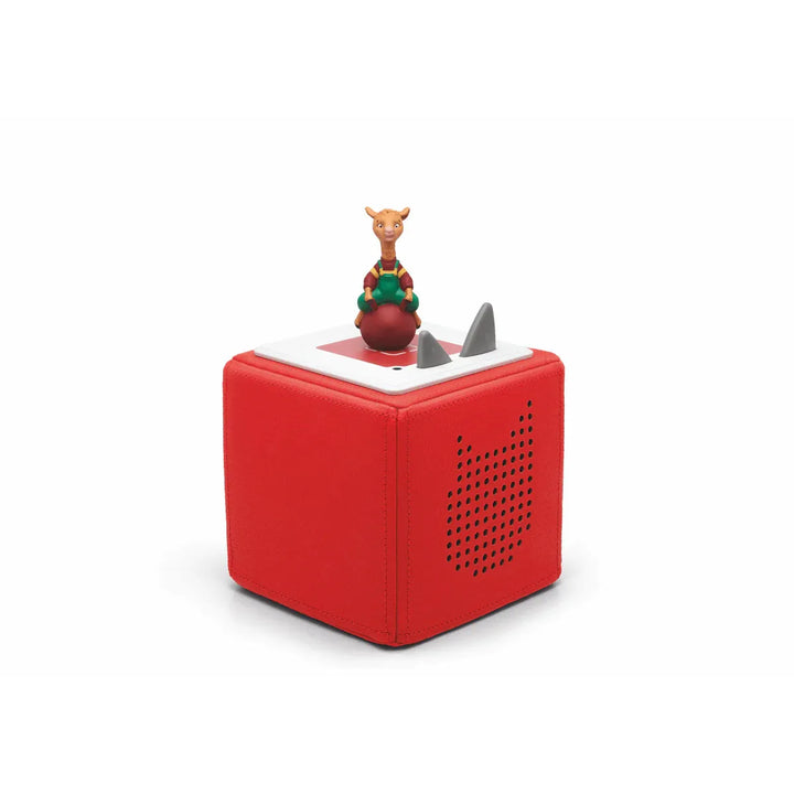 Red toy box with a figurine on top against a white background