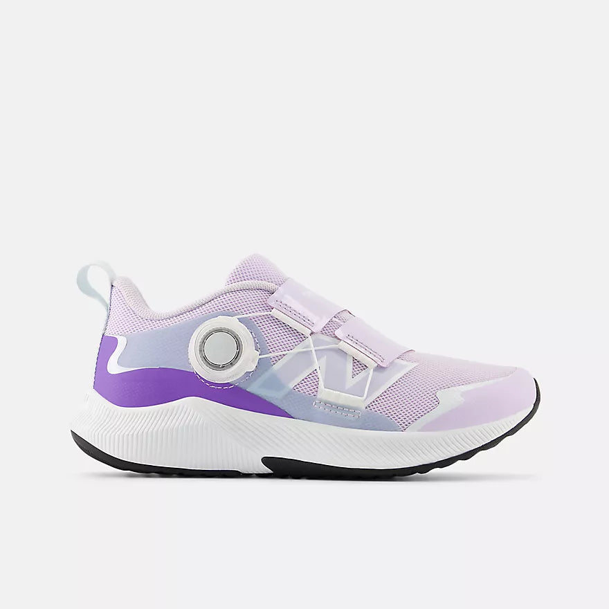 Purple and white sneaker on a light gray background