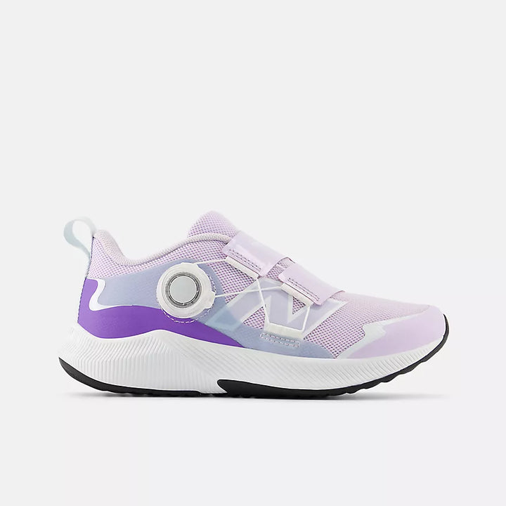 Purple and white sneaker on a light gray background