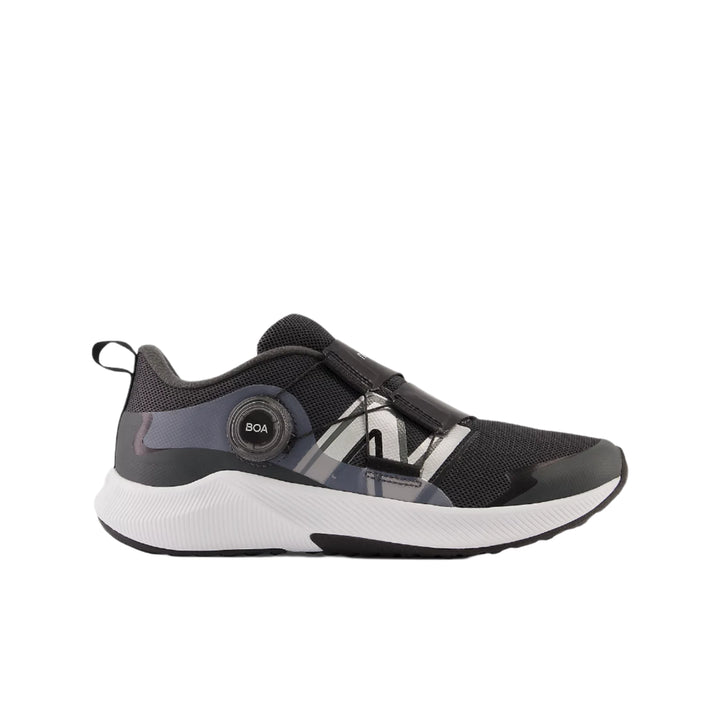 A pair of New Balance DynaSoft Reveal v4 BOA sneakers for little kids and big kids, featuring a red and black color scheme with white accents and the BOA logo.