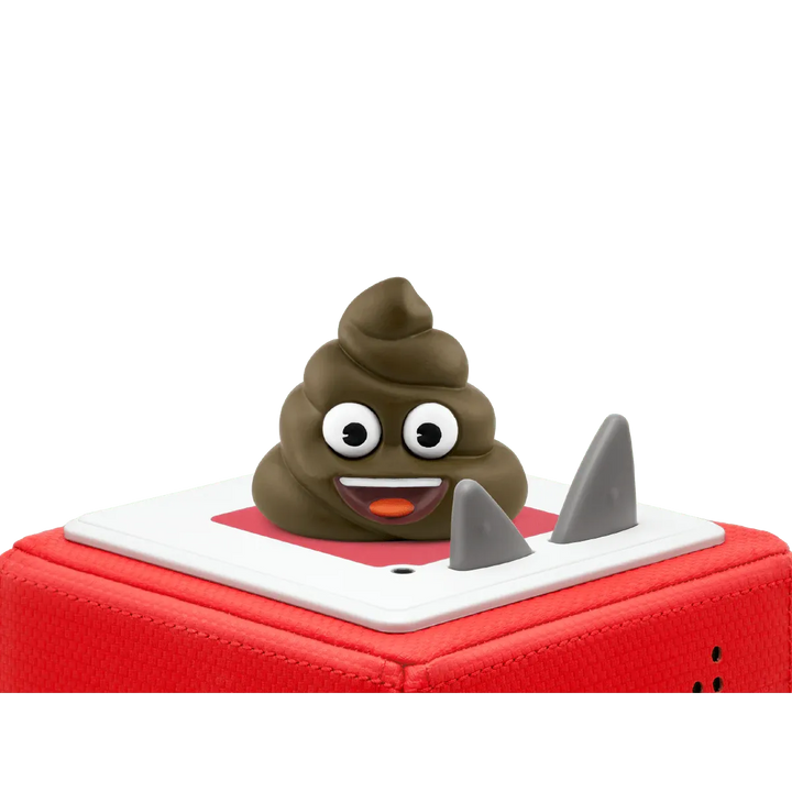 Toy poop emoji on a red and white boat with shark fins on a white background