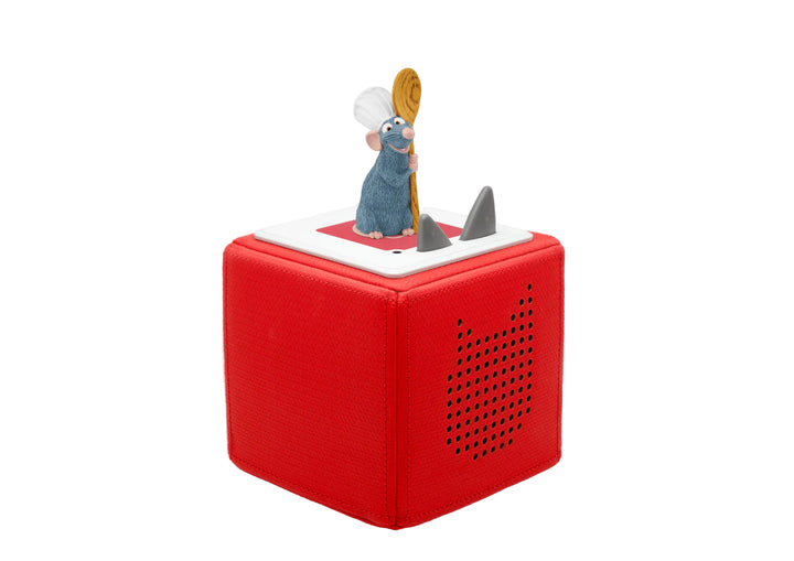Red toy box with a figurine of a mouse holding a wooden spoon on top