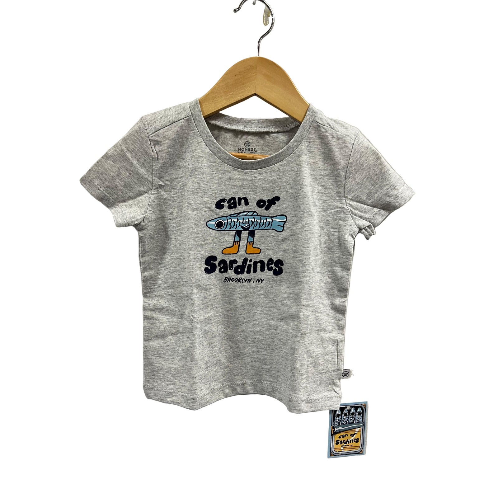 Gray t-shirt with a graphic design on a hanger against a gray background