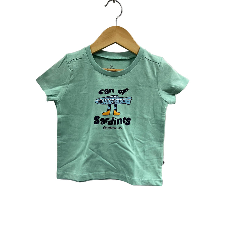 Green t-shirt with a graphic design on a hanger against a gray background