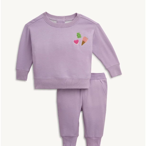 Purple children's sweatshirt and pants set with ice cream cone and heart designs on a white background