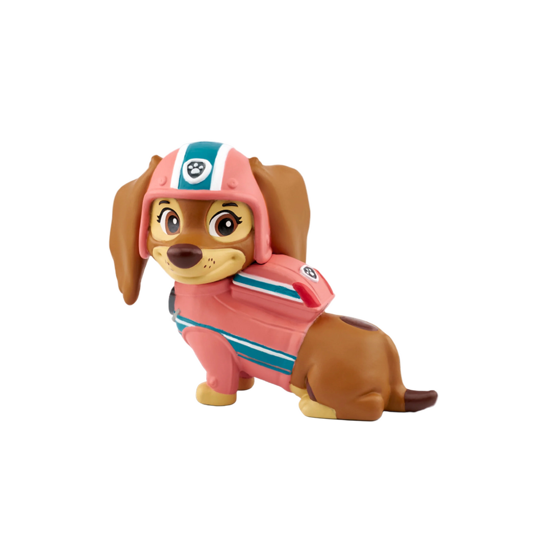 A plastic toy figure of PAW Patrol character Liberty, with pink and blue uniform and dog-like features.