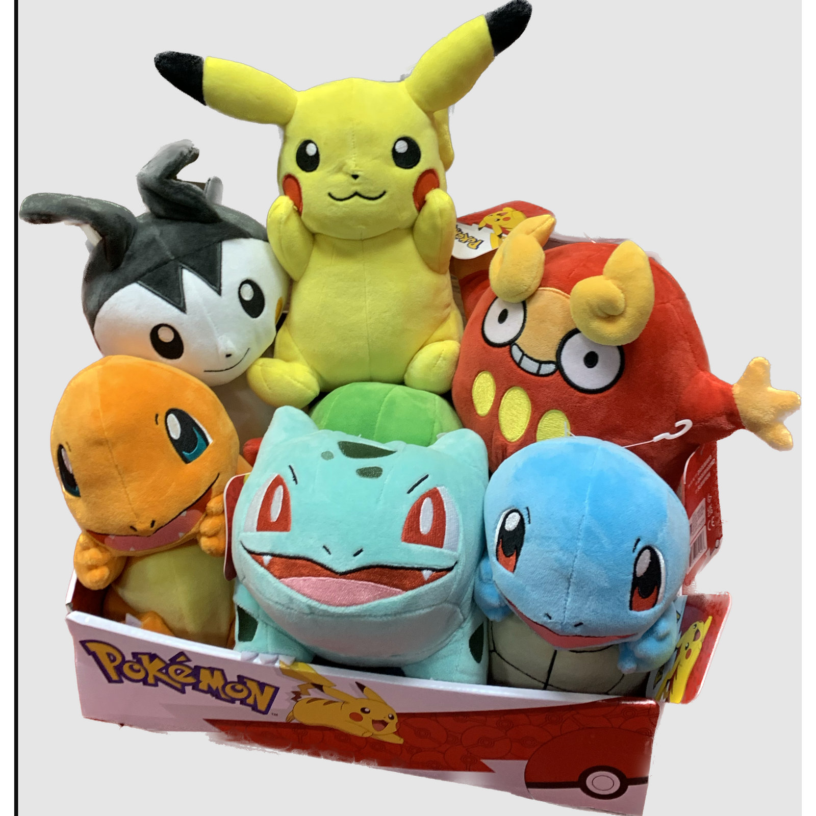 A collection of colorful 8 inch plush Pokemon toys, including Pikachu, Charmander, Squirtle, and others, displayed in a group outside of packaging.