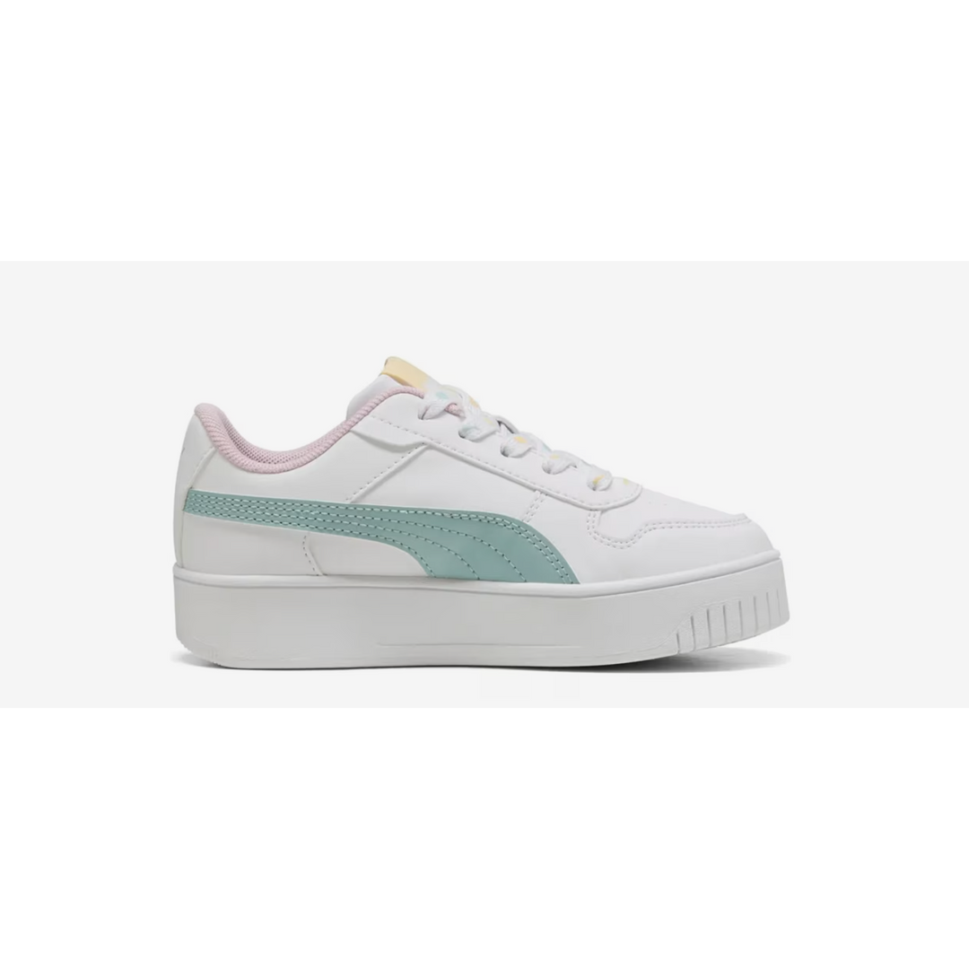 White sneaker with green accents on a white background