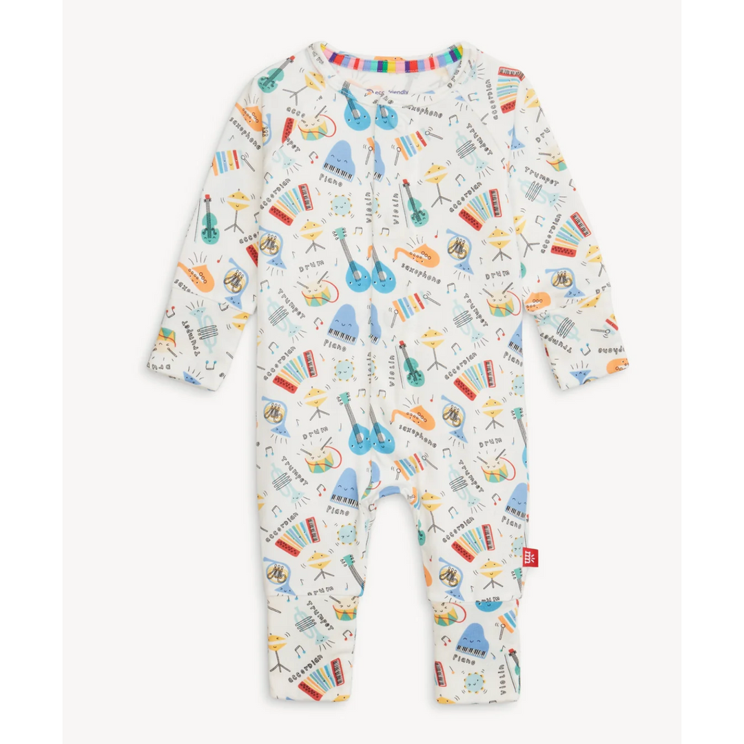 Baby onesie with musical instrument pattern on a white background
