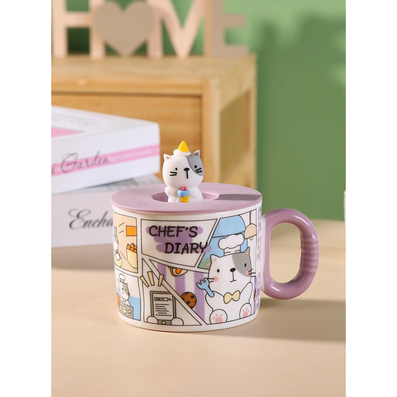 Mug with cartoon cat design and pink lid on a surface