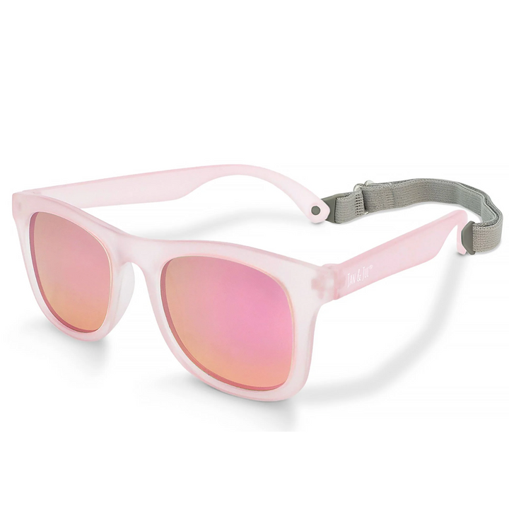 Pink sunglasses with a gray strap to keep them in place