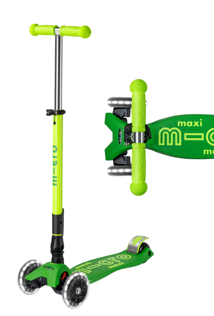 Green scooter with 'maxi micro' branding on a white background