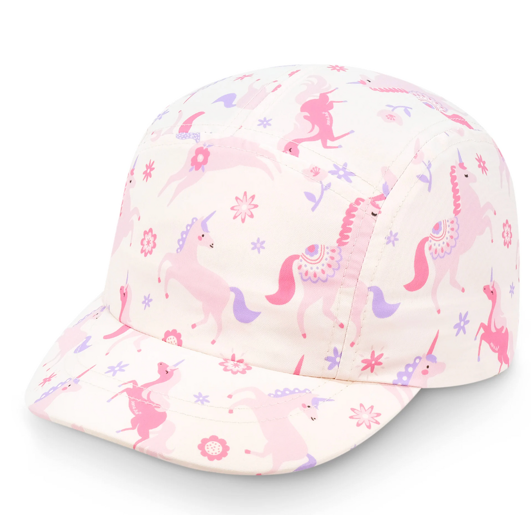 Pink unicorn patterned cap on a white background