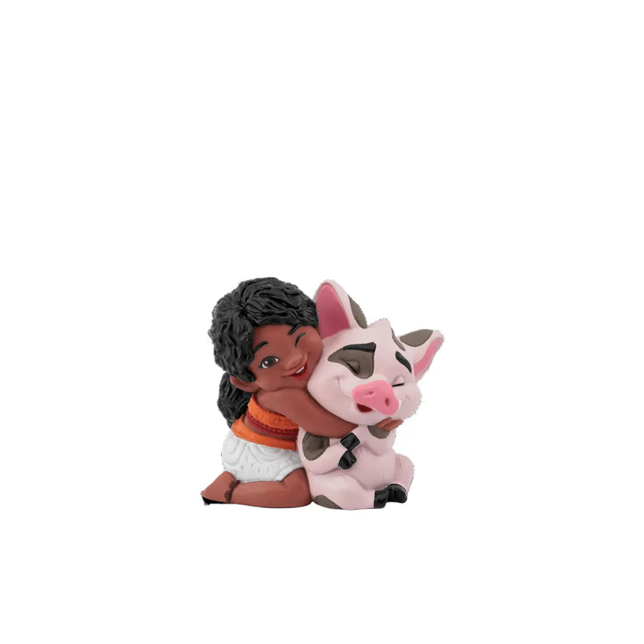 Figurine of a girl hugging a piggy on a white background