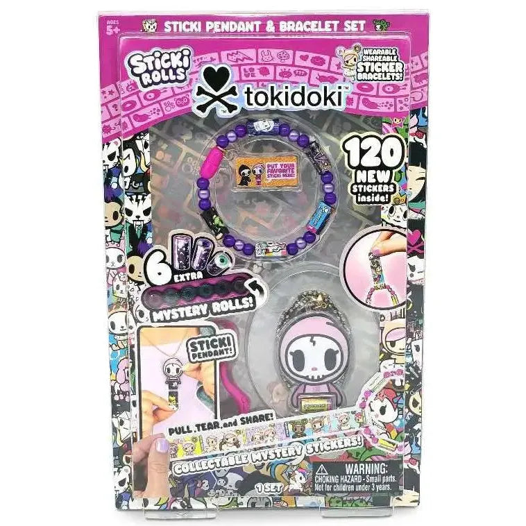 Tokidoki Sticki Pendant &amp; Bracelet Set in retail packaging, featuring a purple beaded bracelet, a character pendant, and promotional graphics for stickers and mystery rolls.