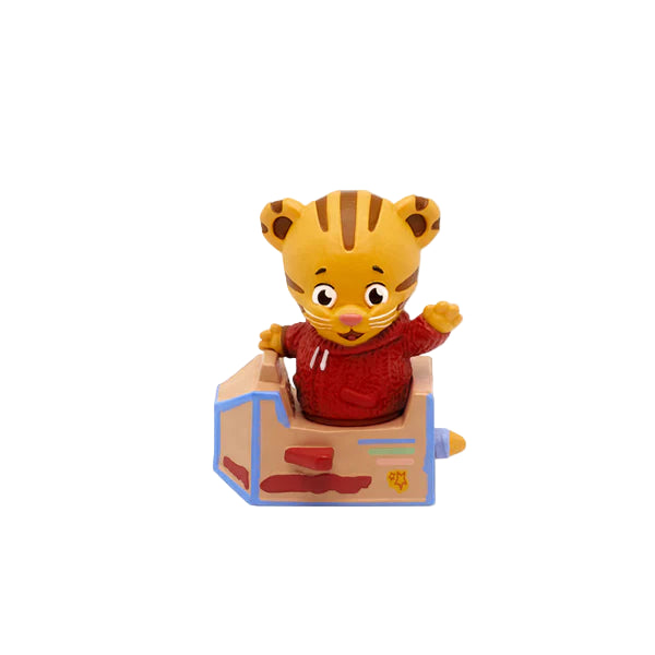 Toy figure of a tiger in a red hoodie on a white background