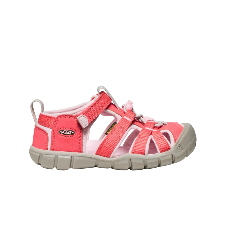 Pink sandal with beige sole on a white background