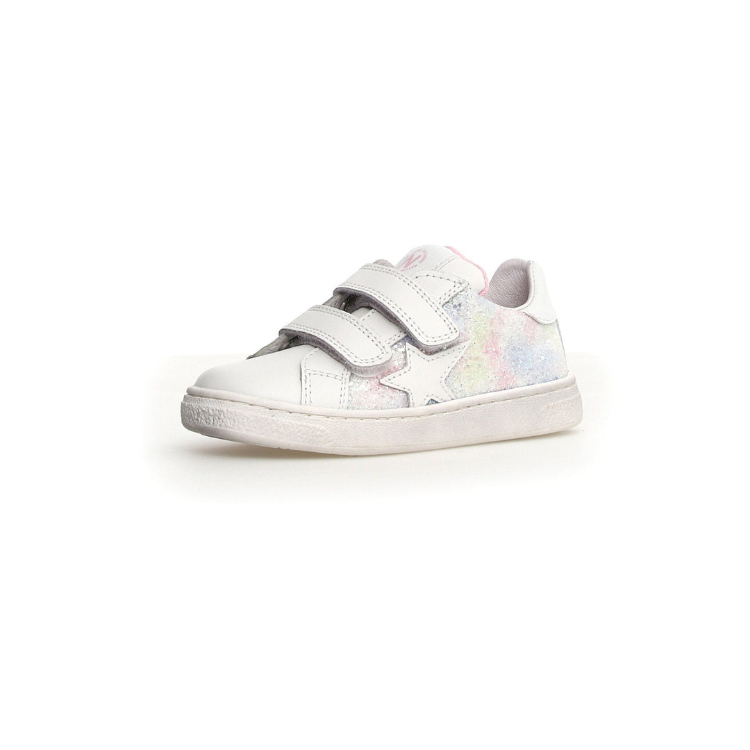 A white Naturino Pinn VL sneaker with a glittered patch on the side, featuring double Velcro straps for closure.
