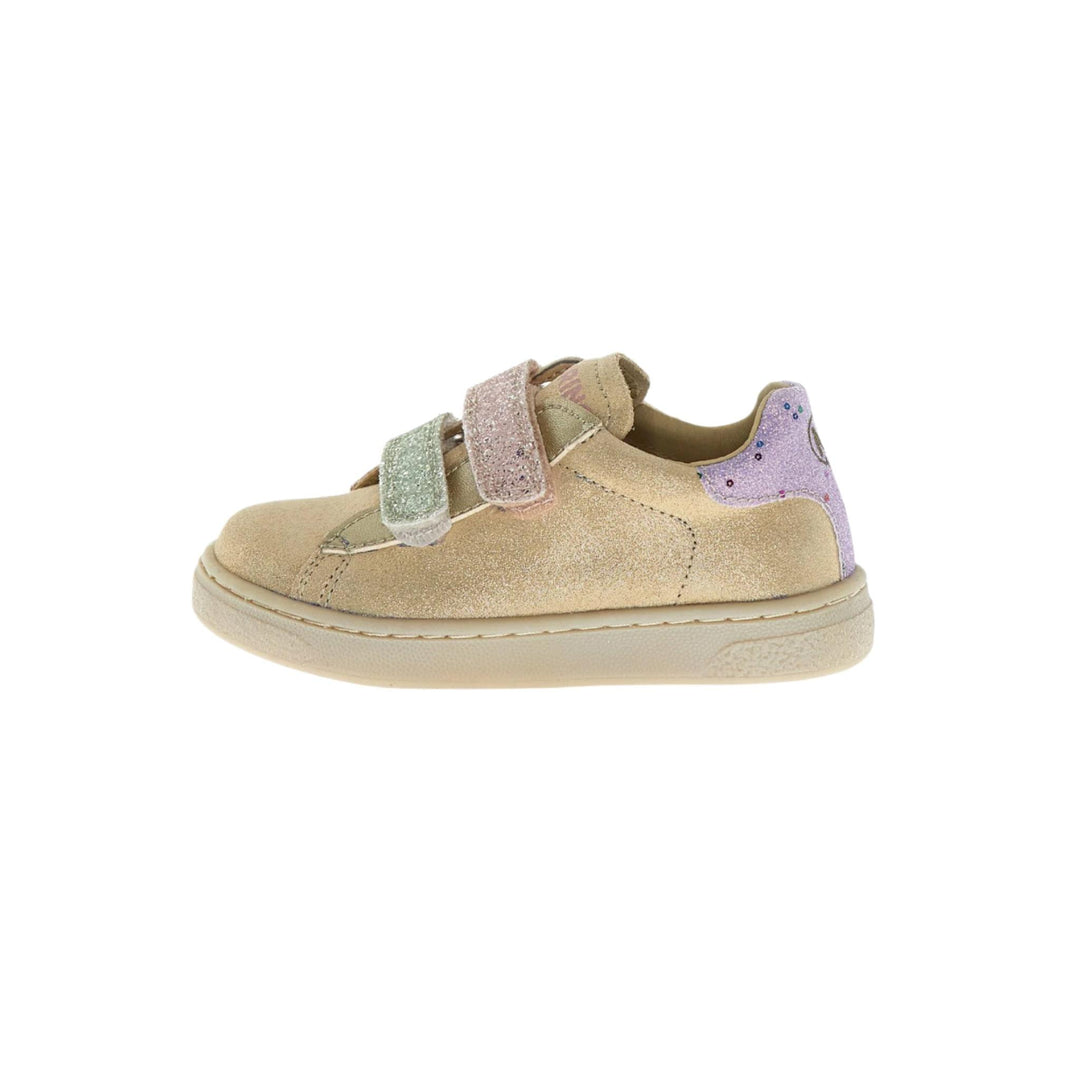 Beige children's shoe with colorful velcro straps on a white background