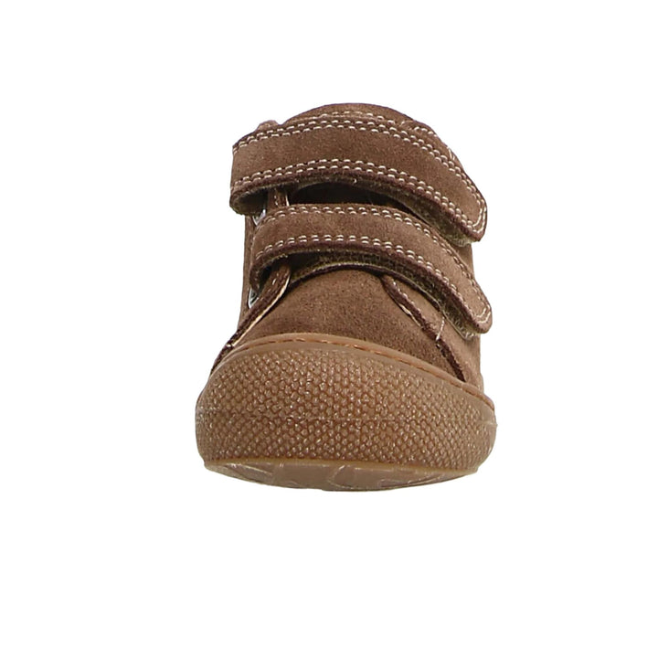 Brown children's shoe with velcro straps on a white background