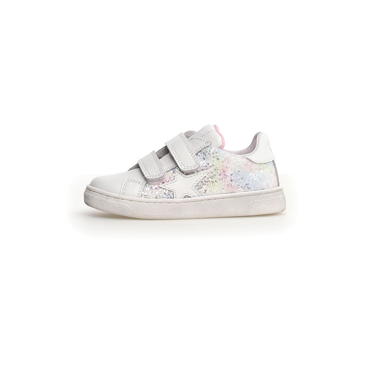 A white Naturino Pinn VL sneaker for toddlers with a glittered patch on the side and double Velcro straps.